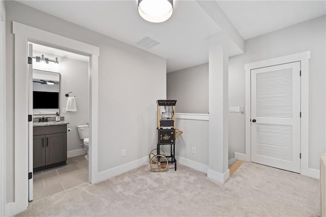 1010 Fendley St, Woodstock, GA 30188 - corridor featuring light colored carpet, baseboards, and a sink