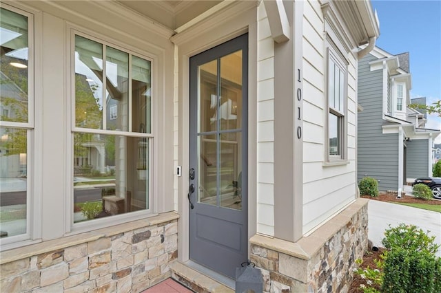 1010 Fendley St, Woodstock, GA 30188 - view of exterior entry featuring stone siding