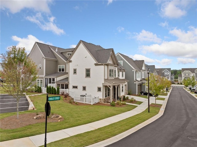 1010 Fendley St, Woodstock, GA 30188 - view of home's exterior with a residential view and a yard