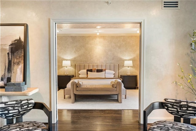 bedroom featuring dark hardwood / wood-style floors