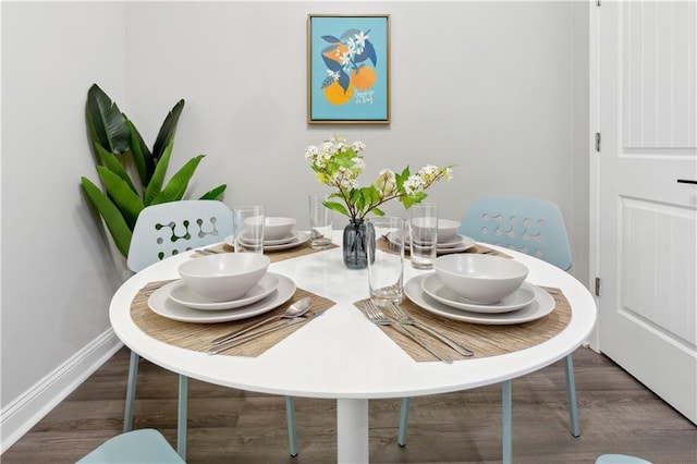 dining area featuring hardwood / wood-style floors