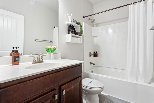 full bathroom with vanity, toilet, and shower / tub combo