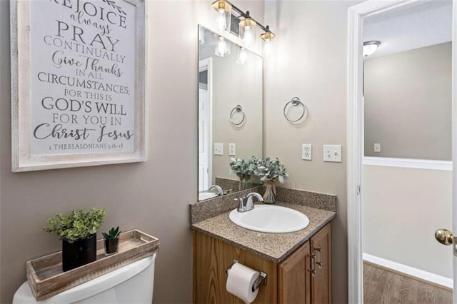 carpeted empty room with a textured ceiling, a ceiling fan, visible vents, and baseboards