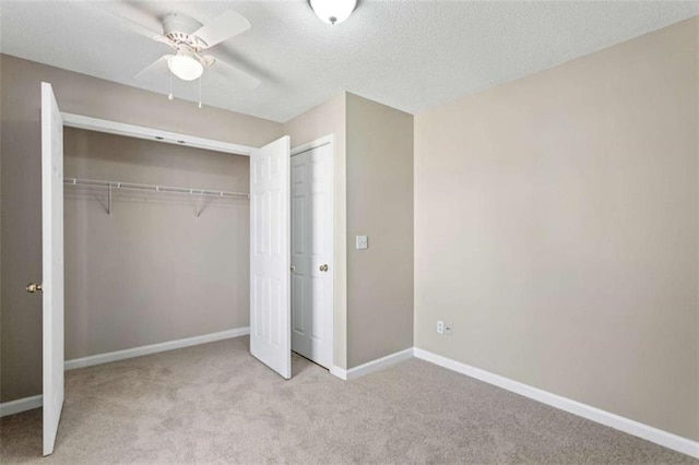 garage featuring baseboards, electric panel, and a garage door opener