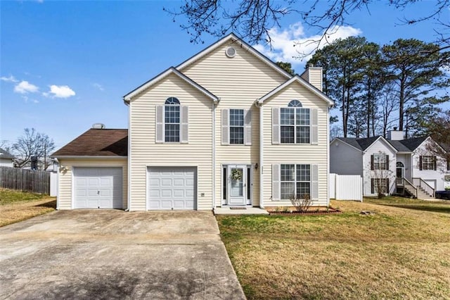 traditional-style home featuring an attached garage, fence, driveway, a front lawn, and a chimney