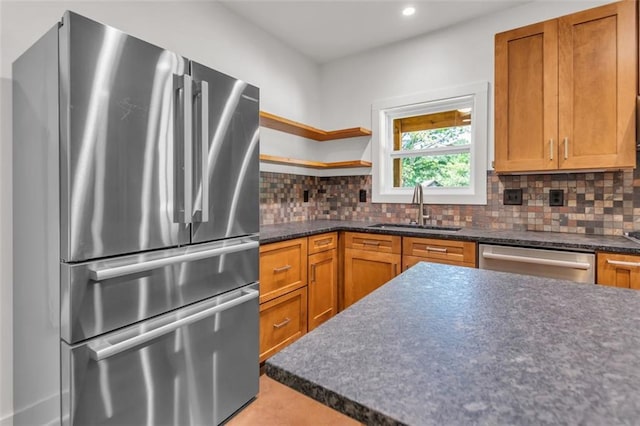618 W Glade Creek Rd, Clarkesville, GA 30523 - kitchen featuring stainless steel appliances, a sink, dark countertops, backsplash, and recessed lighting