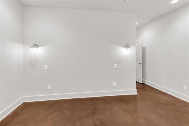 618 W Glade Creek Rd, Clarkesville, GA 30523 - spare room featuring baseboards, recessed lighting, and concrete floors