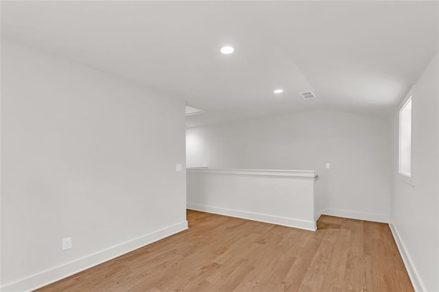 618 W Glade Creek Rd, Clarkesville, GA 30523 - empty room with vaulted ceiling, baseboards, light wood-type flooring, and recessed lighting