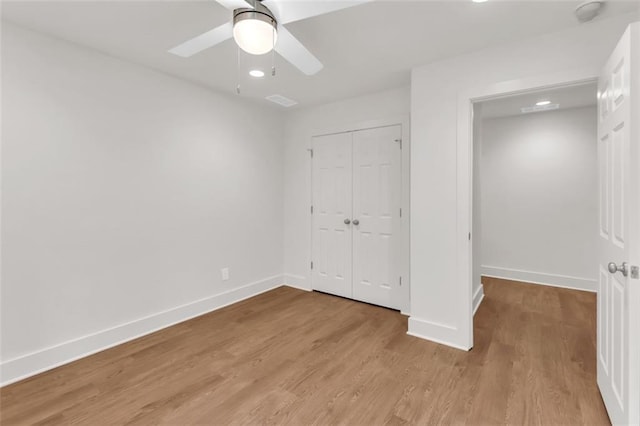 618 W Glade Creek Rd, Clarkesville, GA 30523 - unfurnished bedroom featuring baseboards, light wood finished floors, a closet, a ceiling fan, and recessed lighting
