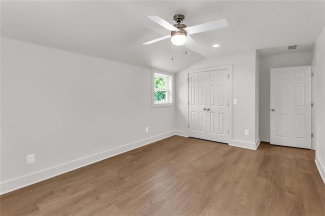 618 W Glade Creek Rd, Clarkesville, GA 30523 - unfurnished bedroom with baseboards, wood finished floors, vaulted ceiling, a closet, and a ceiling fan