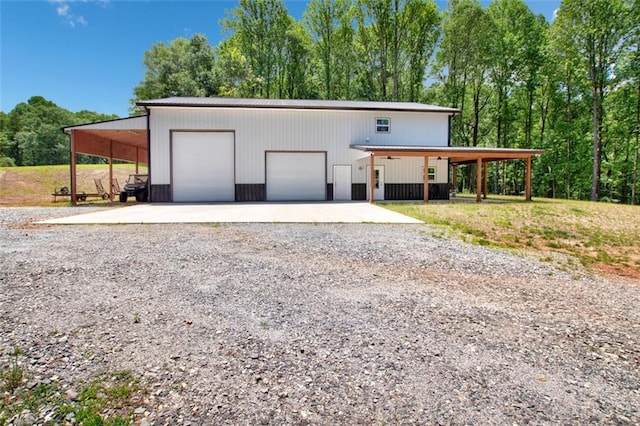 618 W Glade Creek Rd, Clarkesville, GA 30523 - view of front of house with an outbuilding, a detached garage, and driveway