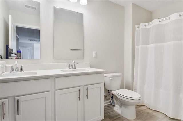 301 Merganser Dr, Pooler, GA 31322 - full bath with visible vents, a sink, double vanity, and toilet