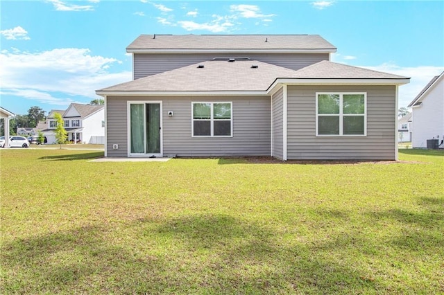 301 Merganser Dr, Pooler, GA 31322 - rear view of house featuring a lawn, central AC, and roof with shingles