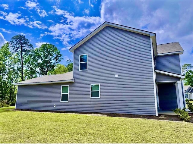 301 Merganser Dr, Pooler, GA 31322 - view of home's exterior featuring a lawn