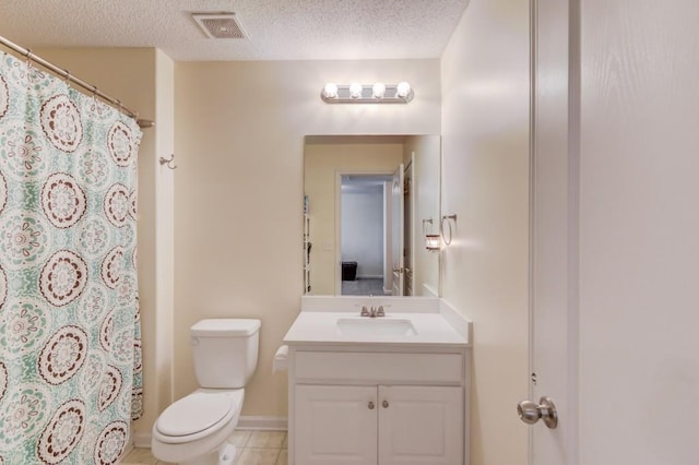 full bath featuring visible vents, toilet, vanity, tile patterned floors, and a textured ceiling
