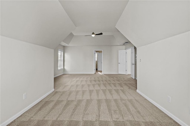 bonus room featuring baseboards and carpet floors