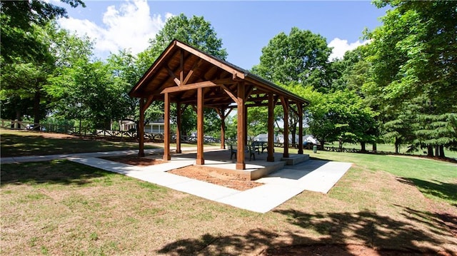 view of home's community featuring a gazebo and a lawn