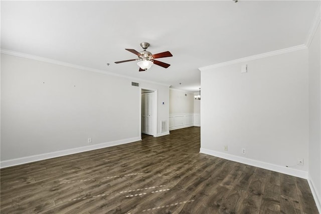 2825 NE Expy NE Unit F003, Atlanta, GA 30345 - spare room featuring ornamental molding, a ceiling fan, and dark wood-style flooring