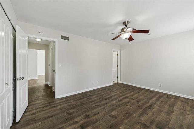 2825 NE Expy NE Unit F003, Atlanta, GA 30345 - empty room featuring a ceiling fan and dark wood-type flooring