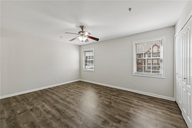 2825 NE Expy NE Unit F003, Atlanta, GA 30345 - unfurnished bedroom with a closet, dark wood-style floors, and ceiling fan