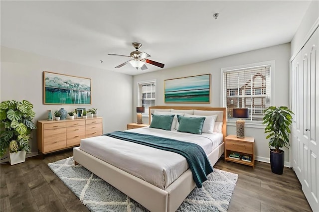 2825 NE Expy NE Unit F003, Atlanta, GA 30345 - bedroom with a closet, dark wood-style floors, and a ceiling fan