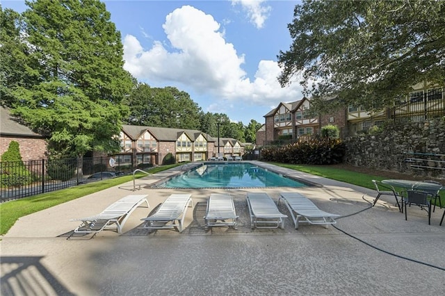 2825 NE Expy NE Unit F003, Atlanta, GA 30345 - community pool featuring a patio and a residential view
