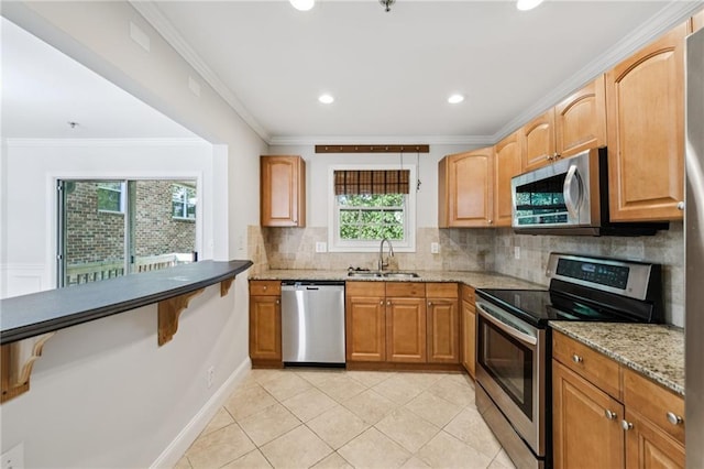 2825 NE Expy NE Unit F003, Atlanta, GA 30345 - kitchen with stainless steel appliances, light stone counters, tasteful backsplash, crown molding, and light tile patterned flooring