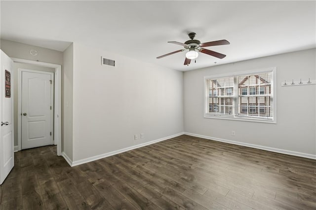 2825 NE Expy NE Unit F003, Atlanta, GA 30345 - empty room featuring dark wood-type flooring and ceiling fan