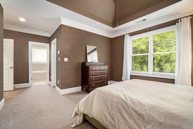 bedroom with baseboards, light colored carpet, ornamental molding, and ensuite bathroom