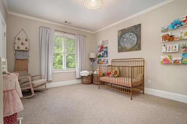 bedroom with a nursery area, ornamental molding, carpet flooring, and baseboards