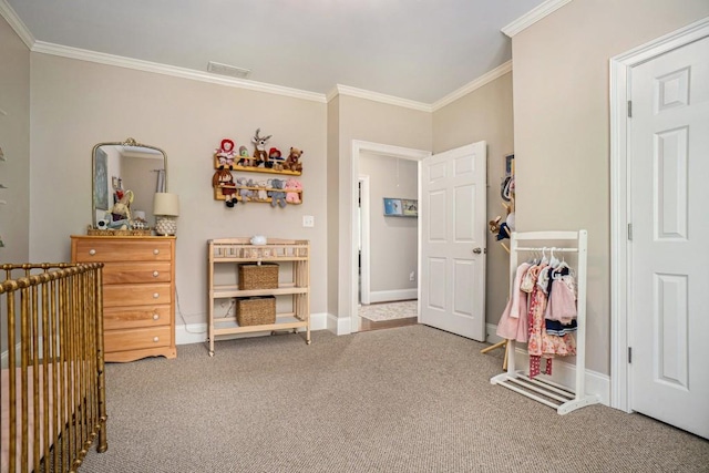 bedroom featuring ornamental molding, carpet, and baseboards