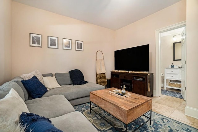 living area featuring tile patterned floors