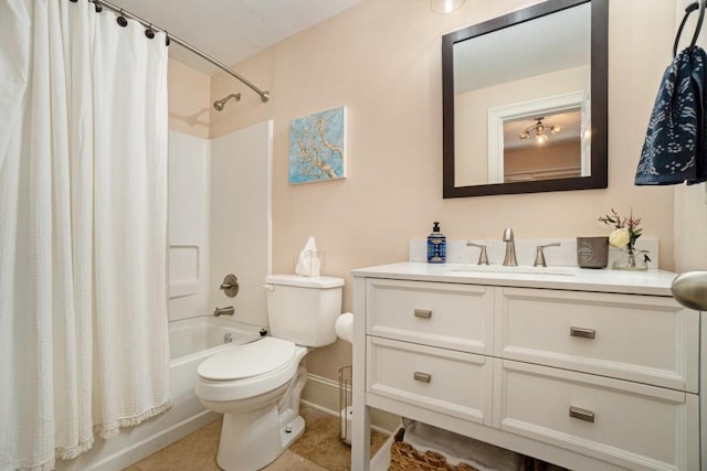 full bath with shower / tub combo, toilet, vanity, baseboards, and tile patterned floors