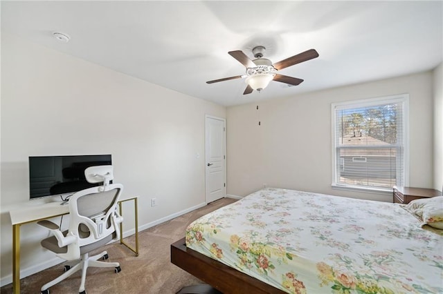 bedroom featuring baseboards, carpet floors, and ceiling fan