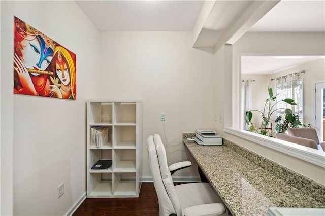 office area featuring dark wood-style floors and baseboards