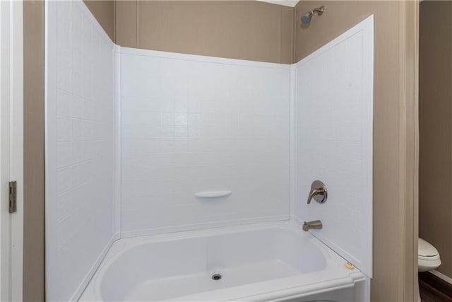 full bath with a textured ceiling, a sink, two vanities, wood finished floors, and visible vents