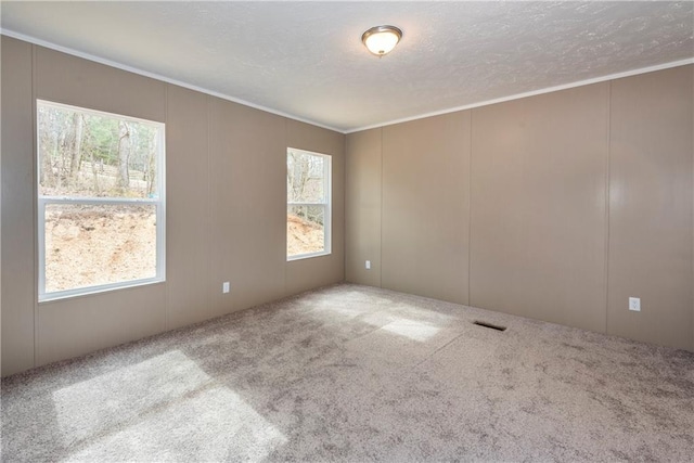 clothes washing area with laundry area, ornamental molding, dark wood finished floors, and electric dryer hookup