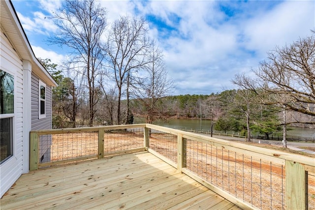 wooden terrace with a water view