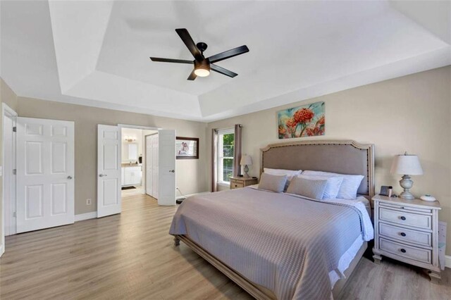 829 Verdun Way, Marietta, GA 30064 - bedroom featuring baseboards, a ceiling fan, wood finished floors, and a raised ceiling
