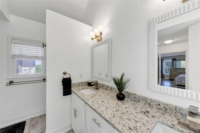 829 Verdun Way, Marietta, GA 30064 - full bathroom featuring baseboards, vanity, ensuite bathroom, and plenty of natural light