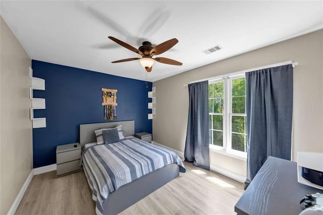 829 Verdun Way, Marietta, GA 30064 - bedroom with visible vents, baseboards, a ceiling fan, and wood finished floors