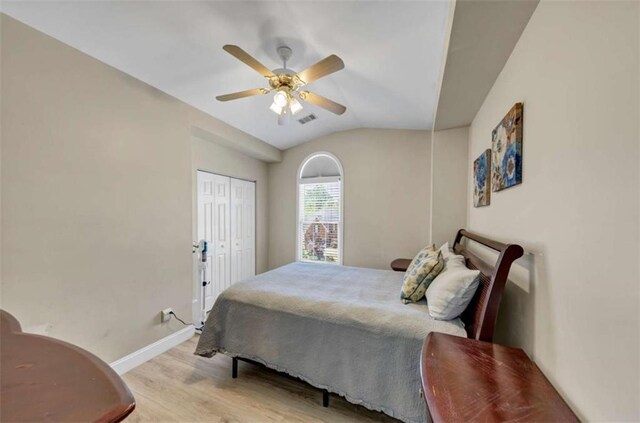 829 Verdun Way, Marietta, GA 30064 - bedroom with vaulted ceiling, wood finished floors, visible vents, a closet, and baseboards