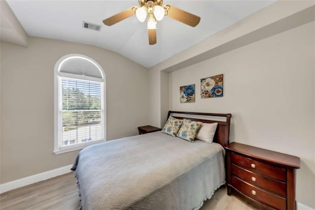 829 Verdun Way, Marietta, GA 30064 - bedroom featuring light wood-style flooring, vaulted ceiling, baseboards, visible vents, and a ceiling fan