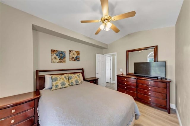 829 Verdun Way, Marietta, GA 30064 - bedroom with ceiling fan, vaulted ceiling, light wood-style floors, and baseboards