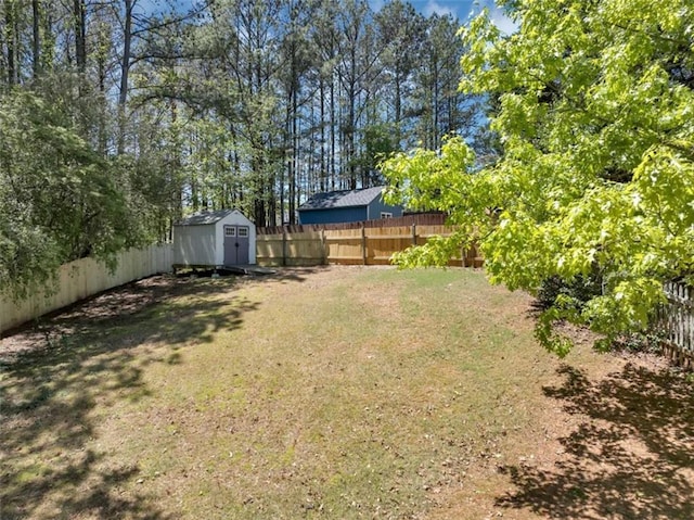 829 Verdun Way, Marietta, GA 30064 - view of yard with a storage shed, an outbuilding, and a fenced backyard