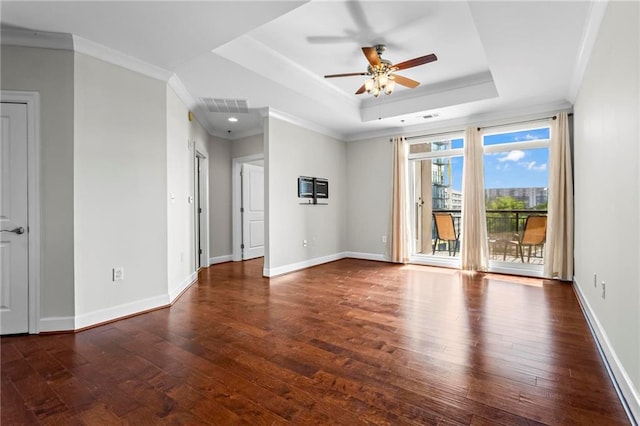325 E Paces Ferry Rd NE Unit 703, Atlanta, GA 30305 - unfurnished room with ceiling fan, hardwood / wood-style floors, a tray ceiling, baseboards, and crown molding