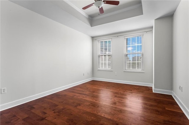 325 E Paces Ferry Rd NE Unit 703, Atlanta, GA 30305 - spare room with a raised ceiling, hardwood / wood-style floors, ornamental molding, baseboards, and a ceiling fan