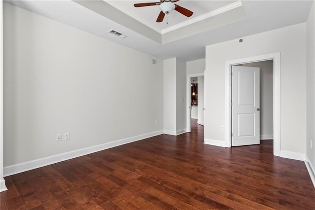 325 E Paces Ferry Rd NE Unit 703, Atlanta, GA 30305 - spare room with a raised ceiling, ceiling fan, dark wood-style floors, crown molding, and baseboards