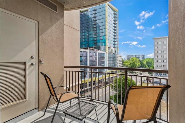325 E Paces Ferry Rd NE Unit 703, Atlanta, GA 30305 - balcony with a city view