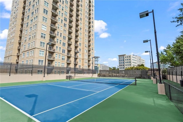 325 E Paces Ferry Rd NE Unit 703, Atlanta, GA 30305 - view of tennis court featuring community basketball court